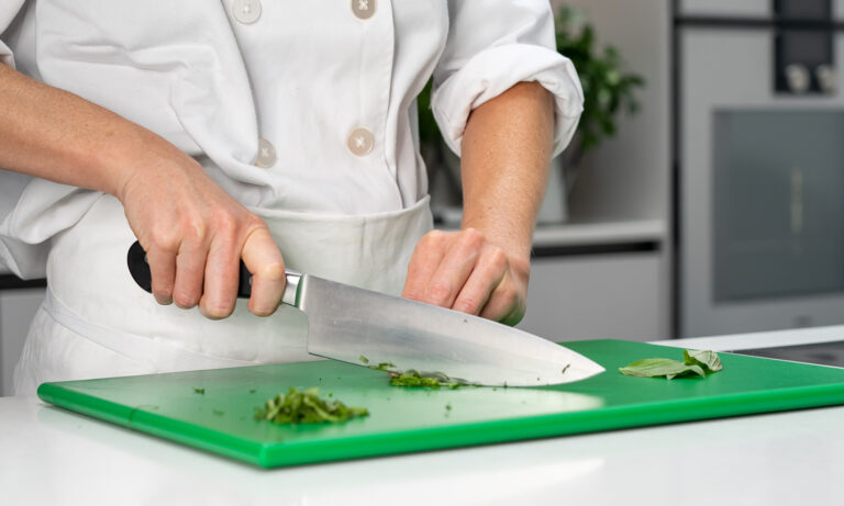 Image of chef cutting vegetables
